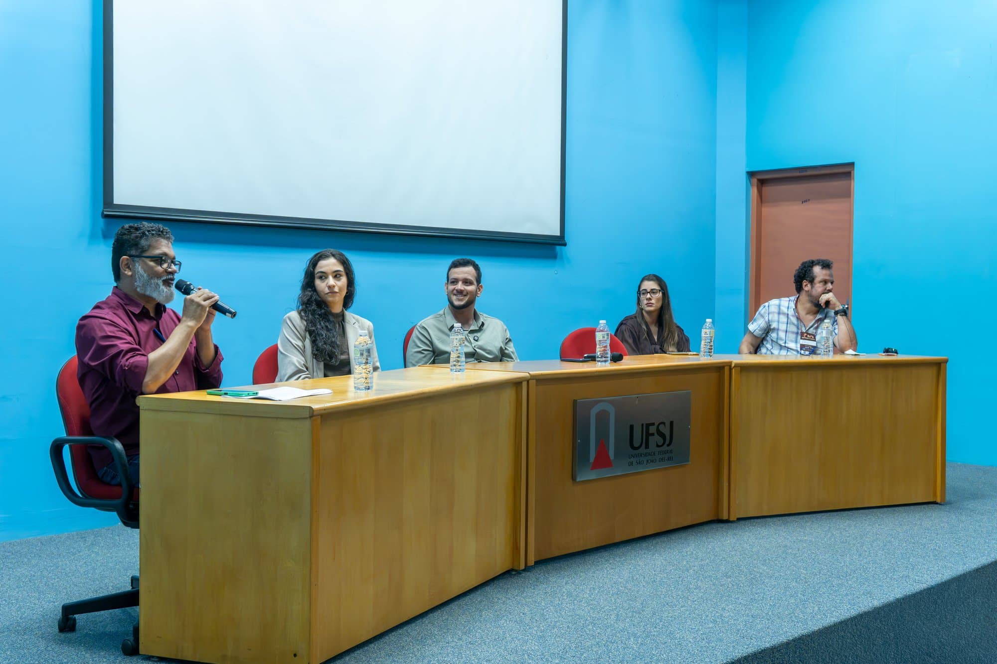 Ítalo Castro no palco do SECOMP 2026 — Semana da Computação da UFSJ, São João del-Rei/MG — foto 1
